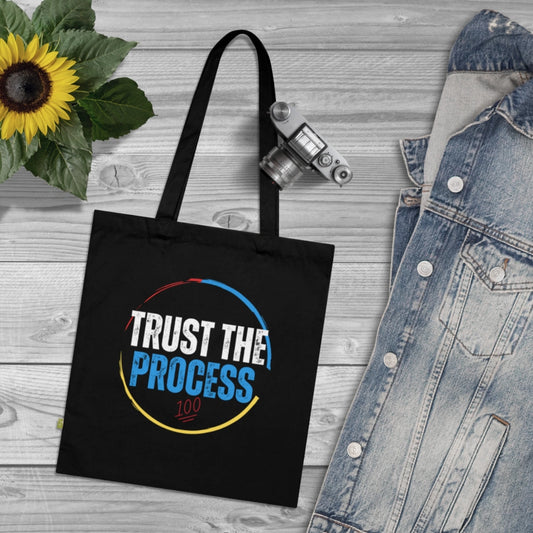 Trust the Process canvas bags.